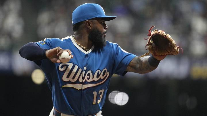 May 22, 2026; Milwaukee, Wisconsin, USA; Milwaukee Brewers third baseman Luis Rengifo (13) fields and throws the ball to first base against the Los Angeles Dodgers in the seventh inning at American Family Field. Mandatory Credit: Michael McLoone-Imagn Images