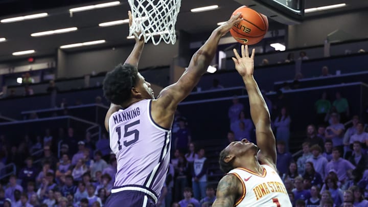 Feb 1, 2026; Manhattan, Kansas, USA; Kansas State Wildcats forward Taj Manning (15) blocks the shot of Iowa State Cyclones guard Jamarion Batemon (1) during the second half at Bramlage Coliseum.