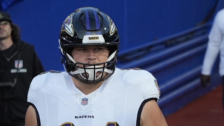 Sep 7, 2025; Orchard Park, New York, USA; Baltimore Ravens center Tyler Linderbaum (64) and center Corey Bullock (67) enter the field for warm up prior to the game against the Buffalo Bills at Highmark Stadium. Mandatory Credit: Gregory Fisher-Imagn Images Sep 7, 2025; Orchard Park, New York, USA; Baltimore Ravens center Tyler Linderbaum (64) and center Corey Bullock (67) enter the field for warm up prior to the game against the Buffalo Bills at Highmark Stadium. Mandatory Credit: Gregory Fisher-Imagn Images