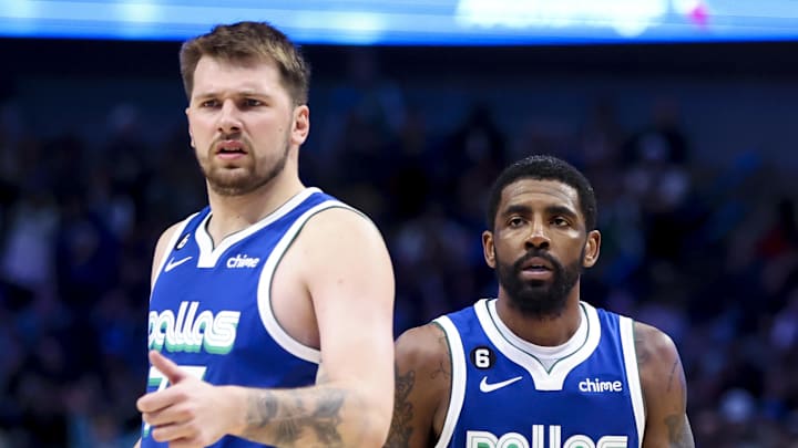 Apr 5, 2023; Dallas, Texas, USA;  Dallas Mavericks guard Luka Doncic (77) and Dallas Mavericks guard Kyrie Irving (2) react during the fourth quarter against the Sacramento Kings at American Airlines Center. Mandatory Credit: Kevin Jairaj-Imagn Images