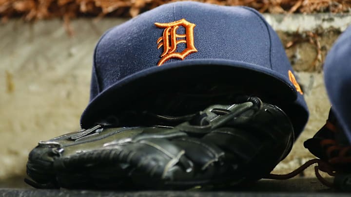The hat and glove of a Detroit Tigers player