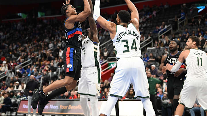 Dec 3, 2024; Detroit, Michigan, USA; Detroit Pistons guard Jaden Ivey (23) shoots the ball over Milwaukee Bucks forwards Taurean Prince (12) and Giannis Antetokounmpo (34) in the third quarter at Little Caesars Arena. Mandatory Credit: Lon Horwedel-Imagn Images Dec 3, 2024; Detroit, Michigan, USA; Detroit Pistons guard Jaden Ivey (23) shoots the ball over Milwaukee Bucks forwards Taurean Prince (12) and Giannis Antetokounmpo (34) in the third quarter at Little Caesars Arena. Mandatory Credit: Lon Horwedel-Imagn Images