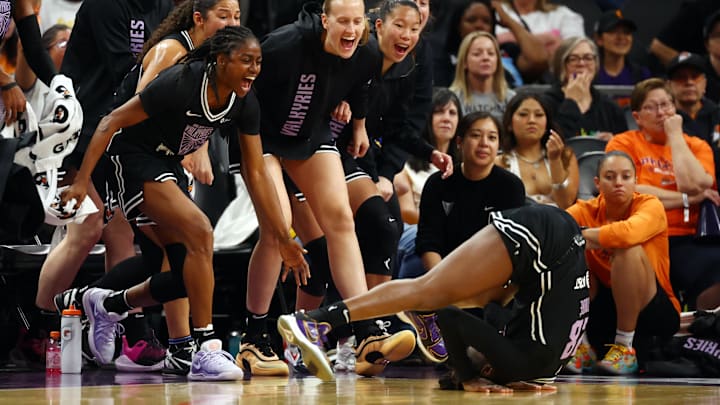 Golden State Valkyries players on the bench celebrate the shot by guard Migna Toure (28) against the Phoenix Mercury during a preseason game at PHX Arena.