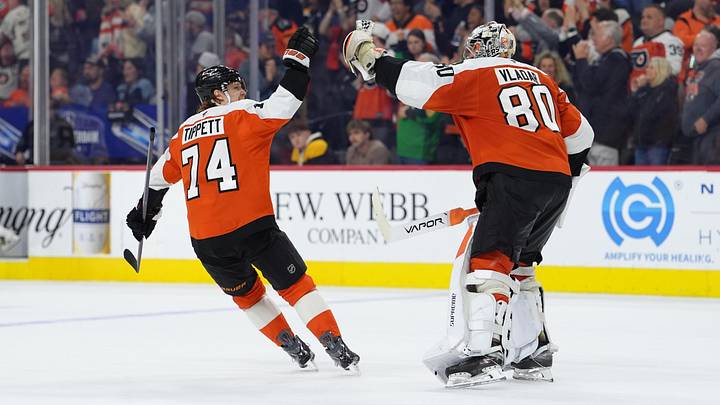 Apr 5, 2026; Philadelphia, Pennsylvania, USA; Philadelphia Flyers right wing Owen Tippett (74) celebrates with goalie Dan Vladar (80) after the game against the Boston Bruins at Xfinity Mobile Arena. 