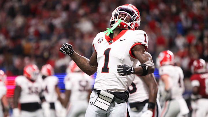 Dec 6, 2025; Atlanta, GA, USA; Georgia Bulldogs wide receiver Zachariah Branch (1) celebrates after scoring a touchdown during the fourth quarter against the Alabama Crimson Tide during the 2025 SEC Championship game at Mercedes-Benz Stadium. Mandatory Credit: Brett Davis-Imagn Images
