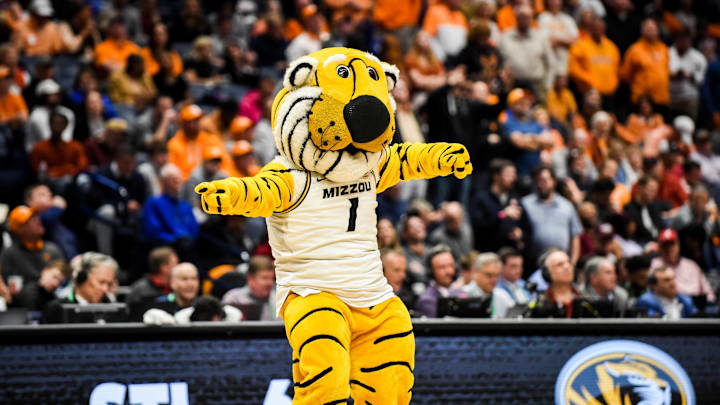 Mizzou mascot, Truman the Tiger, (1) celebrates as his team takes the lead in a game last season.