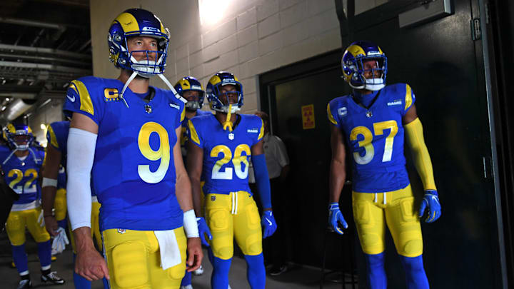 Sep 21, 2025; Philadelphia, Pennsylvania, USA; Los Angeles Rams quarterback Matthew Stafford (9), safety Kamren Kinchens (26) and safety Quentin Lake (37) wait in the tunnel against the Philadelphia Eagles at Lincoln Financial Field. Mandatory Credit: Eric Hartline-Imagn Images