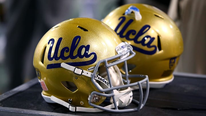 Sep 25, 2014; Tempe, AZ, USA; Detailed view of UCLA Bruins helmets on the sidelines against the Arizona State Sun Devils at Sun Devil Stadium. Mandatory Credit: Mark J. Rebilas-Imagn Images