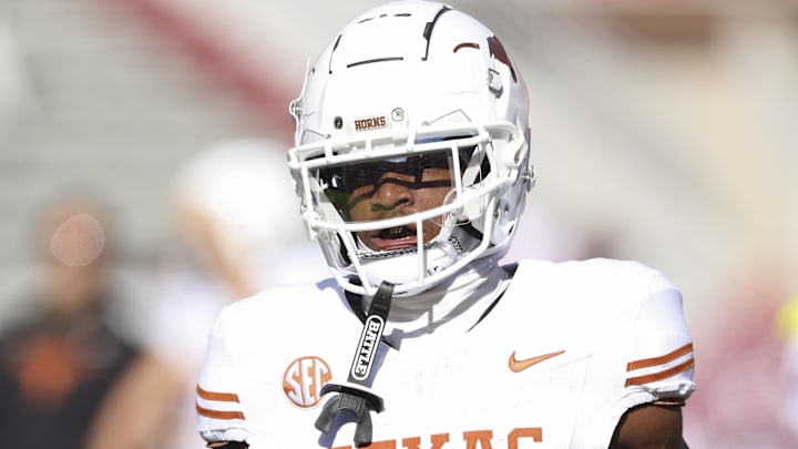 Nov 16, 2024; Fayetteville, Arkansas, USA; Texas Longhorns wide receiver Isaiah Bond (7) warms up prior to the game against the Arkansas Razorbacks at Donald W. Reynolds Razorback Stadium. Mandatory Credit: Nelson Chenault-Imagn Images