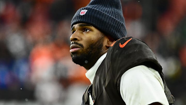 Cleveland Browns quarterback Shedeur Sanders (12) watches from the sidelines late in the fourth quarter against the Tennessee Titans at Huntington Bank Field. Cleveland Browns quarterback Shedeur Sanders (12) watches from the sidelines late in the fourth quarter against the Tennessee Titans at Huntington Bank Field.