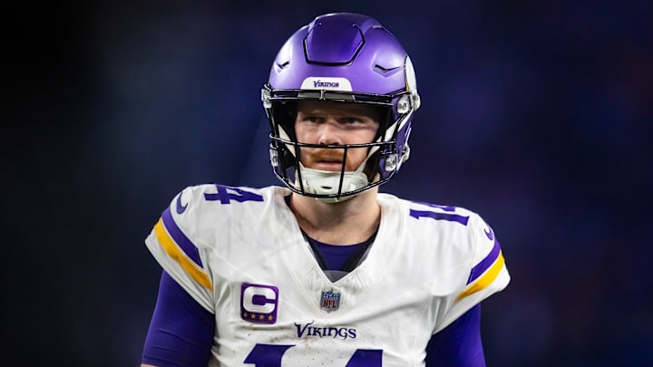 Jan 13, 2025; Glendale, AZ, USA; Minnesota Vikings quarterback Sam Darnold (14) against the Los Angeles Rams during an NFC wild card game at State Farm Stadium. Jan 13, 2025; Glendale, AZ, USA; Minnesota Vikings quarterback Sam Darnold (14) against the Los Angeles Rams during an NFC wild card game at State Farm Stadium.