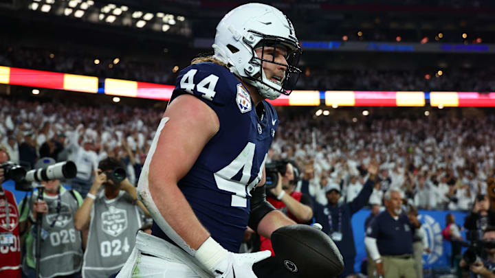 Dec 31, 2024; Glendale, AZ, USA; Penn State Nittany Lions tight end Tyler Warren (44) reacts after scoring a touchdown against the Boise State Broncos during the first half in the Fiesta Bowl at State Farm Stadium. Mandatory Credit: Mark J. Rebilas-Imagn Images Dec 31, 2024; Glendale, AZ, USA; Penn State Nittany Lions tight end Tyler Warren (44) reacts after scoring a touchdown against the Boise State Broncos during the first half in the Fiesta Bowl at State Farm Stadium. Mandatory Credit: Mark J. Rebilas-Imagn Images
