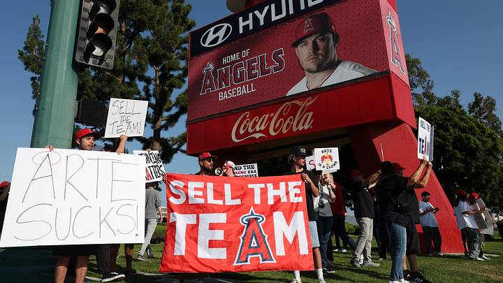 Los Angeles Angels fans gather outside Angel Stadium.