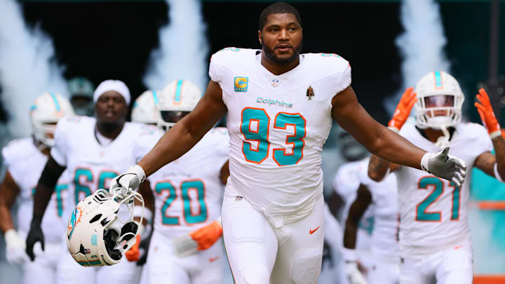 Miami Dolphins defensive tackle Calais Campbell (93) enters the field before the game against the Arizona Cardinals at Hard Rock Stadium.