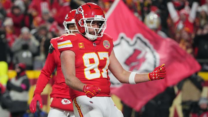 Jan 18, 2025; Kansas City, Missouri, USA; Kansas City Chiefs tight end Travis Kelce (87) reacts after catching a pass for a touchdown against the Houston Texans during the fourth quarter of a 2025 AFC divisional round game at GEHA Field at Arrowhead Stadium. Mandatory Credit: Denny Medley-Imagn Images