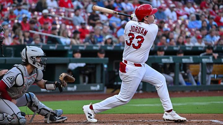 Jun 22, 2026; St. Louis, Missouri, USA; St. Louis Cardinals third baseman Blaze Jordan (33) hits a one run sacrifice fly against the Arizona Diamondbacks during the fourth inning at Busch Stadium. Mandatory Credit: Jeff Curry-Imagn Images