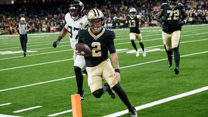 Aug 17, 2025; New Orleans, Louisiana, USA; New Orleans Saints quarterback Spencer Rattler (2) scores a two point conversion to tie the game against the Jacksonville Jaguars in the fourth quarter at Caesars Superdome. Mandatory Credit: Matthew Hinton-Imagn Images Aug 17, 2025; New Orleans, Louisiana, USA; New Orleans Saints quarterback Spencer Rattler (2) scores a two point conversion to tie the game against the Jacksonville Jaguars in the fourth quarter at Caesars Superdome. Mandatory Credit: Matthew Hinton-Imagn Images