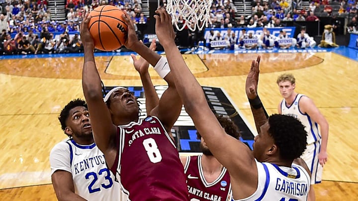 Mar 20, 2026; St. Louis, MO, USA; Santa Clara Broncos forward Elijah Mahi (8) and Kentucky Wildcats forward Brandon Garrison (10) battle for a rebound in the second half during a first round game of the men's 2026 NCAA Tournament at Enterprise Center. Mandatory Credit: Jeff Curry-Imagn Images Mar 20, 2026; St. Louis, MO, USA; Santa Clara Broncos forward Elijah Mahi (8) and Kentucky Wildcats forward Brandon Garrison (10) battle for a rebound in the second half during a first round game of the men's 2026 NCAA Tournament at Enterprise Center. Mandatory Credit: Jeff Curry-Imagn Images
