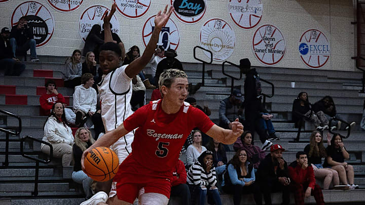 Bozeman's Cash Zirkle makes a play against Bay at John L. Cobb Gymnasium in Panama City, Fla., Dec. 20, 2024. Bay won the game 77-55. (Tyler Orsburn/News Herald)