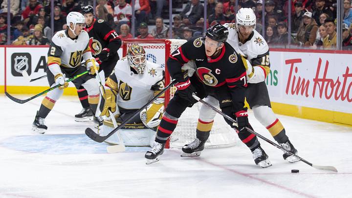 Nov 21, 2024; Ottawa, Ontario, CAN; Ottawa Senators left wing Brady Tkachuk (7) moves the puck away from Vegas Golden Knights defenseman Noah Hanifin (15) in the first period at the Canadian Tire Centre. Mandatory Credit: Marc DesRosiers-Imagn Images Nov 21, 2024; Ottawa, Ontario, CAN; Ottawa Senators left wing Brady Tkachuk (7) moves the puck away from Vegas Golden Knights defenseman Noah Hanifin (15) in the first period at the Canadian Tire Centre. Mandatory Credit: Marc DesRosiers-Imagn Images