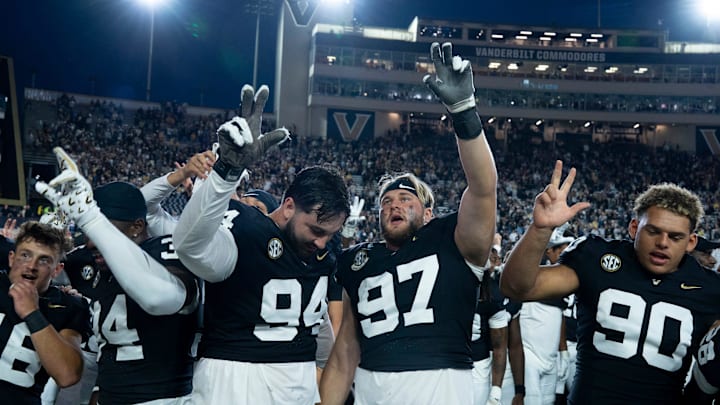 Vanderbilt celebrates by singing the school song with their fans after beating Missouri 17-10 at FirstBank Stadium in Nashville, Tenn., Saturday, Oct. 25, 2025.