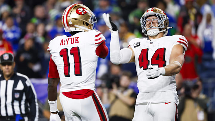 Oct 10, 2024; Seattle, Washington, USA; San Francisco 49ers fullback Kyle Juszczyk (44) celebrates with wide receiver Brandon Aiyuk (11) after rushing for a touchdown against the Seattle Seahawks at Lumen Field. Mandatory Credit: Joe Nicholson-Imagn Images Oct 10, 2024; Seattle, Washington, USA; San Francisco 49ers fullback Kyle Juszczyk (44) celebrates with wide receiver Brandon Aiyuk (11) after rushing for a touchdown against the Seattle Seahawks at Lumen Field. Mandatory Credit: Joe Nicholson-Imagn Images