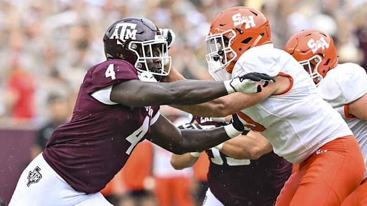 Sep 3, 2022; College Station, Texas, USA;  Texas A&M Aggies defensive lineman Shemar Stewart (4) and Sam Houston State Bearkats offensive lineman Jordan Boatman (70) in action during the fourth quarter at Kyle Field. Mandatory Credit: Maria Lysaker-Imagn Images