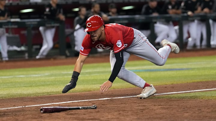 Aug 26, 2023; Phoenix, Arizona, USA; Cincinnati Reds pinch runner Michael Siani (38) slides and scores a run against the Arizona Diamondbacks during the ninth inning at Chase Field. Mandatory Credit: Joe Camporeale-Imagn Images