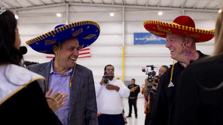 Jedd Fisch, Washington's head football coach, and Jeff Brohm, head Louisville football coach, were welcomed with sombreros as they arrived in El Paso on Thursday, Dec. 26, 2024, for the 2024 Tony the Tiger Sun Bowl.