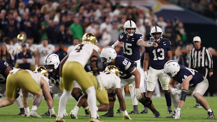 Penn State Nittany Lions quarterback Drew Allar (15) calls a play in the second half against the Notre Dame Fighting Irish in the Orange Bowl at Hard Rock Stadium. 
