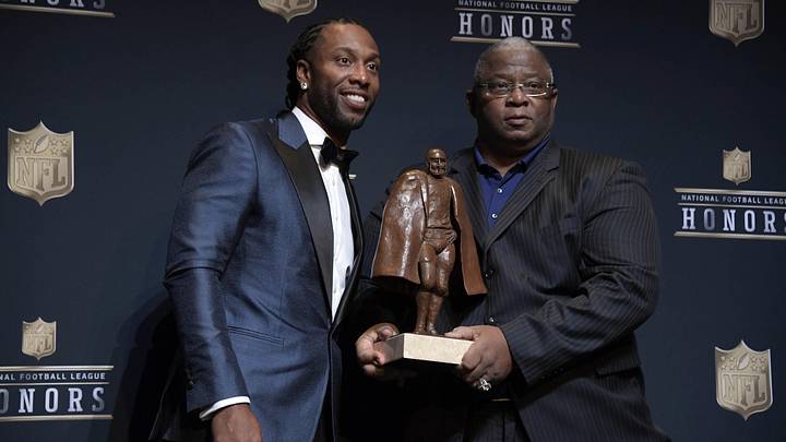 Feb 4, 2017; Houston, TX, USA; Arizona Cardinals wide receiver Larry Fitzgerald (left) poses for a photo with his father Larry Fitzgerald Sr. after being named the co-winner of the Walter Payton NFL Man of the Year during the 6th Annual NFL Honors at Wortham Theater. Mandatory Credit: Kirby Lee-Imagn Images Feb 4, 2017; Houston, TX, USA; Arizona Cardinals wide receiver Larry Fitzgerald (left) poses for a photo with his father Larry Fitzgerald Sr. after being named the co-winner of the Walter Payton NFL Man of the Year during the 6th Annual NFL Honors at Wortham Theater. Mandatory Credit: Kirby Lee-Imagn Images