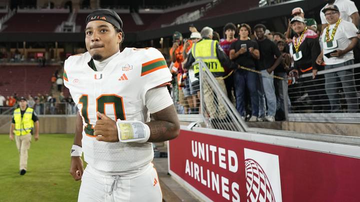 Sep 4, 2026; Stanford, California, USA;  Miami Hurricanes quarterback Darian Mensah (10) runs off the field after defeating the Stanford Cardinal at Stanford Stadium.  Mandatory Credit: Stan Szeto-Imagn Images