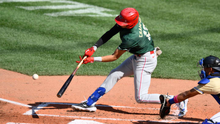 Jul 8, 2023; Seattle, Washington, USA; National League Futures designated hitter Justin Crawford (13) of the Philadelphia Phillies hits an RBI sacrifice fly against the American League during the second inning of the All Star-Futures game at T-Mobile Park. Jul 8, 2023; Seattle, Washington, USA; National League Futures designated hitter Justin Crawford (13) of the Philadelphia Phillies hits an RBI sacrifice fly against the American League during the second inning of the All Star-Futures game at T-Mobile Park.