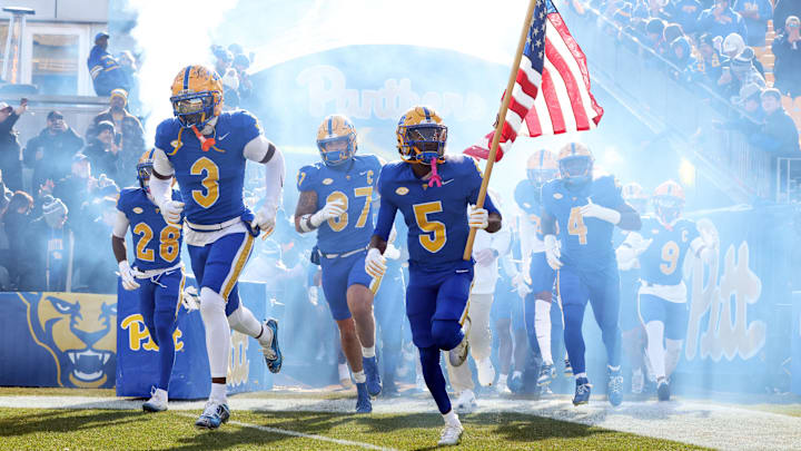 Nov 29, 2025; Pittsburgh, Pennsylvania, USA; Pittsburgh Panthers linebacker Rasheem Biles (3) and wide receiver Raphael Williams Jr. (5) lead the team onto the field to play the Miami Hurricanes at Acrisure Stadium. Mandatory Credit: Charles LeClaire-Imagn Images Nov 29, 2025; Pittsburgh, Pennsylvania, USA; Pittsburgh Panthers linebacker Rasheem Biles (3) and wide receiver Raphael Williams Jr. (5) lead the team onto the field to play the Miami Hurricanes at Acrisure Stadium. Mandatory Credit: Charles LeClaire-Imagn Images