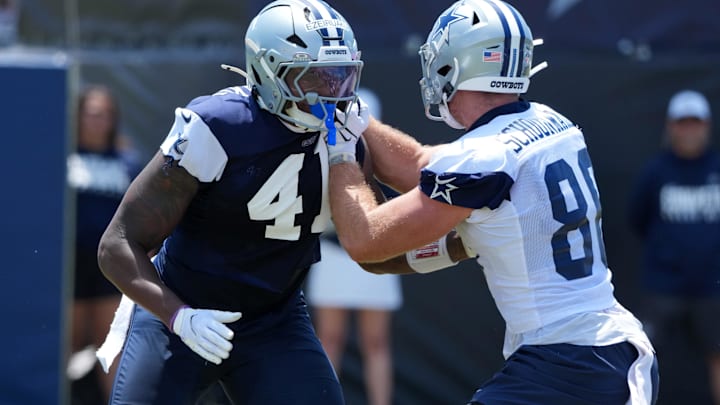 Cowboys defensive end Donovan Ezeiruaku and tight end Luke Schoonmaker at training camp at the River Ridge Fields in Oxnard. 