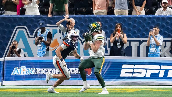 Auburn Tigers safety Eric Winters (5) makes a game-winning tackle on Baylor Bears tight end Matthew Klopfenstein (85) on a two-point conversion attempt at the end of the game as Auburn Tigers take on Baylor Bears in the Aflac Kickoff Game at Mercedes-Benz Stadium in Atlanta, Ga. on Saturday, Sept. 5, 2026. Auburn Tigers defeated Baylor Bears 17-16. Auburn Tigers safety Eric Winters (5) makes a game-winning tackle on Baylor Bears tight end Matthew Klopfenstein (85) on a two-point conversion attempt at the end of the game as Auburn Tigers take on Baylor Bears in the Aflac Kickoff Game at Mercedes-Benz Stadium in Atlanta, Ga. on Saturday, Sept. 5, 2026. Auburn Tigers defeated Baylor Bears 17-16.