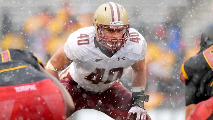 October 29, 2011; College Park, MD, USA; Boston College Eagles linebacker Luke Kuechly (40) gets ready for the play in the game against the Maryland Terrapins at Byrd Stadium. Mandatory Credit: Evan Habeeb-Imagn Images