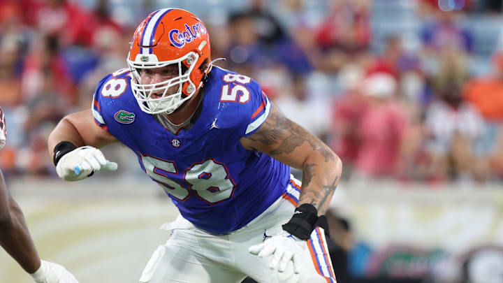 Oct 28, 2023; Jacksonville, Florida, USA; Florida Gators offensive lineman Austin Barber (58) against the Georgia Bulldogs during the second half at EverBank Stadium. Mandatory Credit: Kim Klement Neitzel-Imagn Images Oct 28, 2023; Jacksonville, Florida, USA; Florida Gators offensive lineman Austin Barber (58) against the Georgia Bulldogs during the second half at EverBank Stadium. Mandatory Credit: Kim Klement Neitzel-Imagn Images