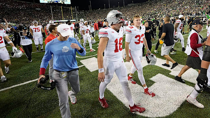 Oct 12, 2024; Eugene, Oregon, USA; Ohio State Buckeyes quarterback Will Howard (18) walks off the field after losing 32-31 to Oregon Ducks during the NCAA football game at Autzen Stadium.
