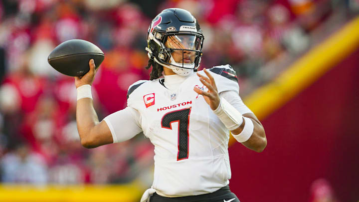 Dec 21, 2024; Kansas City, Missouri, USA; Houston Texans quarterback C.J. Stroud (7) throws a pass during the second half against the Kansas City Chiefs at GEHA Field at Arrowhead Stadium. Mandatory Credit: Jay Biggerstaff-Imagn Images
