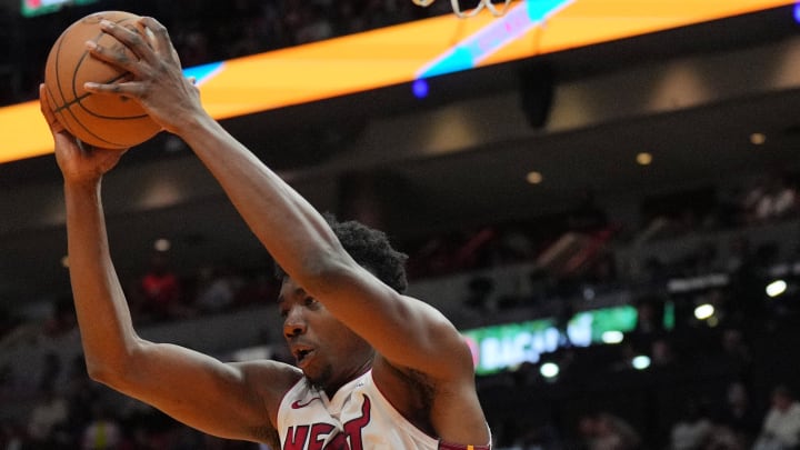 Apr 14, 2024; Miami, Florida, USA; Miami Heat center Thomas Bryant (31) grabs a rebound over Toronto Raptors center Christian Koloko (35) during the second half at Kaseya Center. Mandatory Credit: Jim Rassol-USA TODAY Sports Apr 14, 2024; Miami, Florida, USA; Miami Heat center Thomas Bryant (31) grabs a rebound over Toronto Raptors center Christian Koloko (35) during the second half at Kaseya Center. Mandatory Credit: Jim Rassol-USA TODAY Sports
