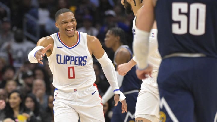 Apr 4, 2024; Los Angeles, California, USA; Los Angeles Clippers guard Russell Westbrook (0) celebrates with guard Amir Coffey (7) in the second half against the Denver Nuggets at Crypto.com Arena. Apr 4, 2024; Los Angeles, California, USA; Los Angeles Clippers guard Russell Westbrook (0) celebrates with guard Amir Coffey (7) in the second half against the Denver Nuggets at Crypto.com Arena.