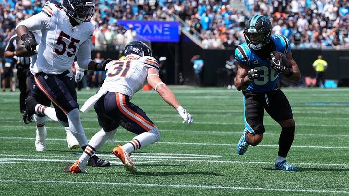 Sep 13, 2026; Charlotte, North Carolina, USA; Carolina Panthers running back Chuba Hubbard (30) runs with the ball while defended by Chicago Bears safety Dillon Thieneman (31) in the first quarter at Bank of America Stadium. Mandatory Credit: Jim Dedmon-Imagn Images Sep 13, 2026; Charlotte, North Carolina, USA; Carolina Panthers running back Chuba Hubbard (30) runs with the ball while defended by Chicago Bears safety Dillon Thieneman (31) in the first quarter at Bank of America Stadium. Mandatory Credit: Jim Dedmon-Imagn Images
