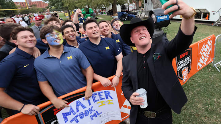 Pat McAfee takes selfie with a flock of polo-wearing Michigan fans
