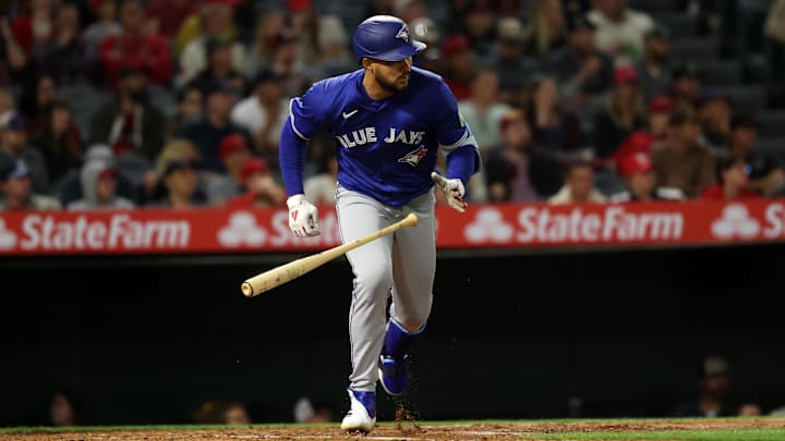 Anaheim, California, USA; Toronto Blue Jays designated hitter Anthony Santander (25) hits an RBI single during the sixth inning against the Los Angeles Angels at Angel Stadium.