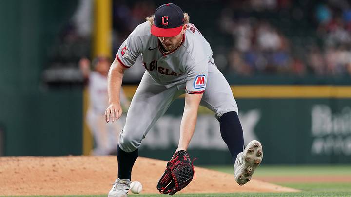 Jun 6, 2026; Arlington, Texas, USA; Cleveland Guardians starting pitcher Tanner Bibee (28) picks up a ground ball in the eighth inning against the Texas Rangers at Globe Life Field. Mandatory Credit: Dustin Safranek-Imagn Images Jun 6, 2026; Arlington, Texas, USA; Cleveland Guardians starting pitcher Tanner Bibee (28) picks up a ground ball in the eighth inning against the Texas Rangers at Globe Life Field. Mandatory Credit: Dustin Safranek-Imagn Images