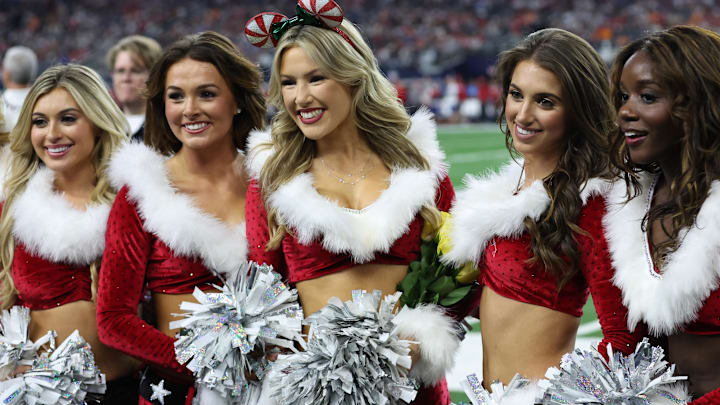 Dallas Cowboys cheerleaders pose on the sidelines during the game against the Tampa Bay Buccaneers.
