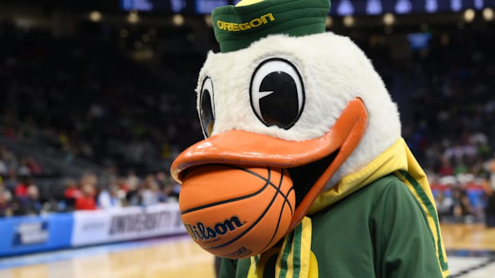 Mar 21, 2025; Seattle, WA, USA; The Oregon Ducks mascot performs during the second half in the first round of the NCAA Tournament at Climate Pledge Arena. Mandatory Credit: Steven Bisig-Imagn Images