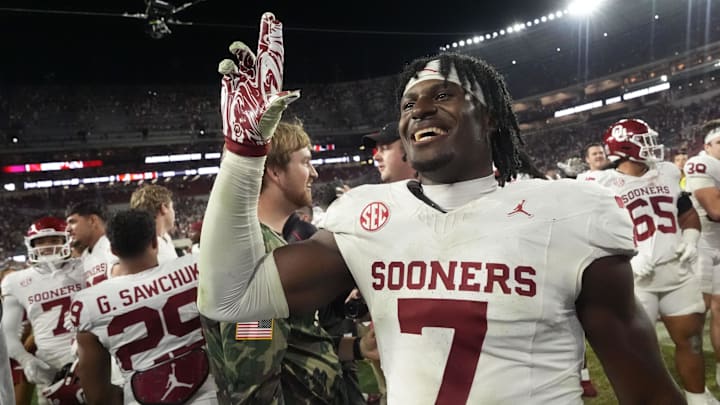 Oklahoma linebacker Sammy Omosigho celebrates after the Sooners' 23-21 win over the Alabama Crimson Tide at Bryant-Denny Stadium on Saturday night.