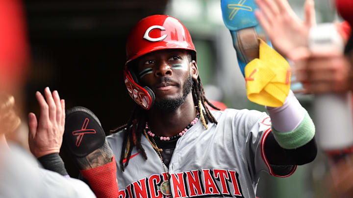 Sep 29, 2024; Chicago, Illinois, USA; Cincinnati Reds shortstop Elly De La Cruz (44) celebrates with teammates in the dugout after scoring during the tenth inning against the Chicago Cubs at Wrigley Field. Mandatory Credit: Patrick Gorski-Imagn Images